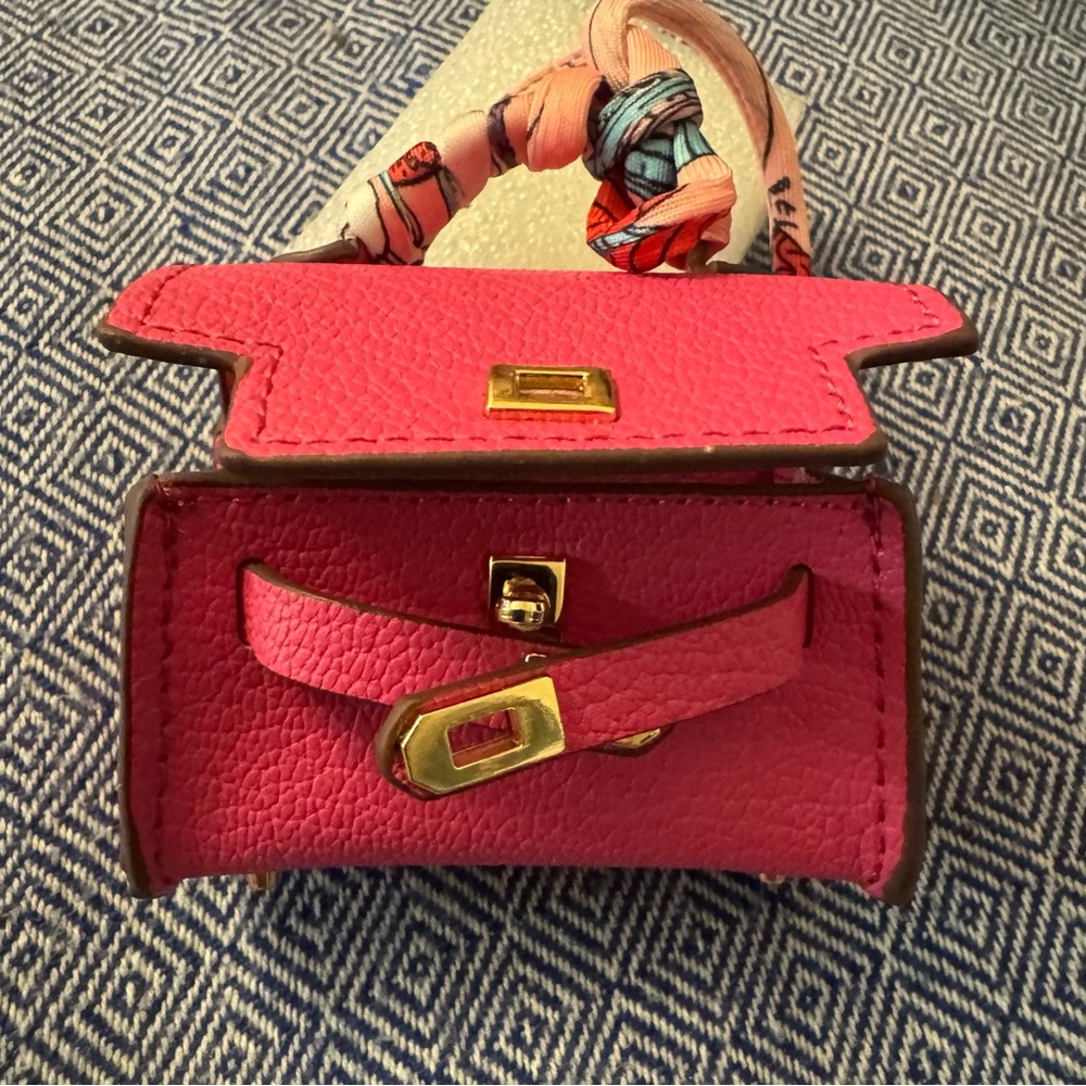 Fushia,Mini Handbag with Gold Accents.